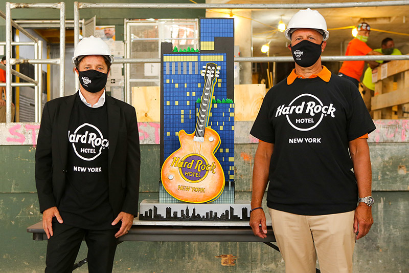 Joe Polisano and Scott Koster with Cake